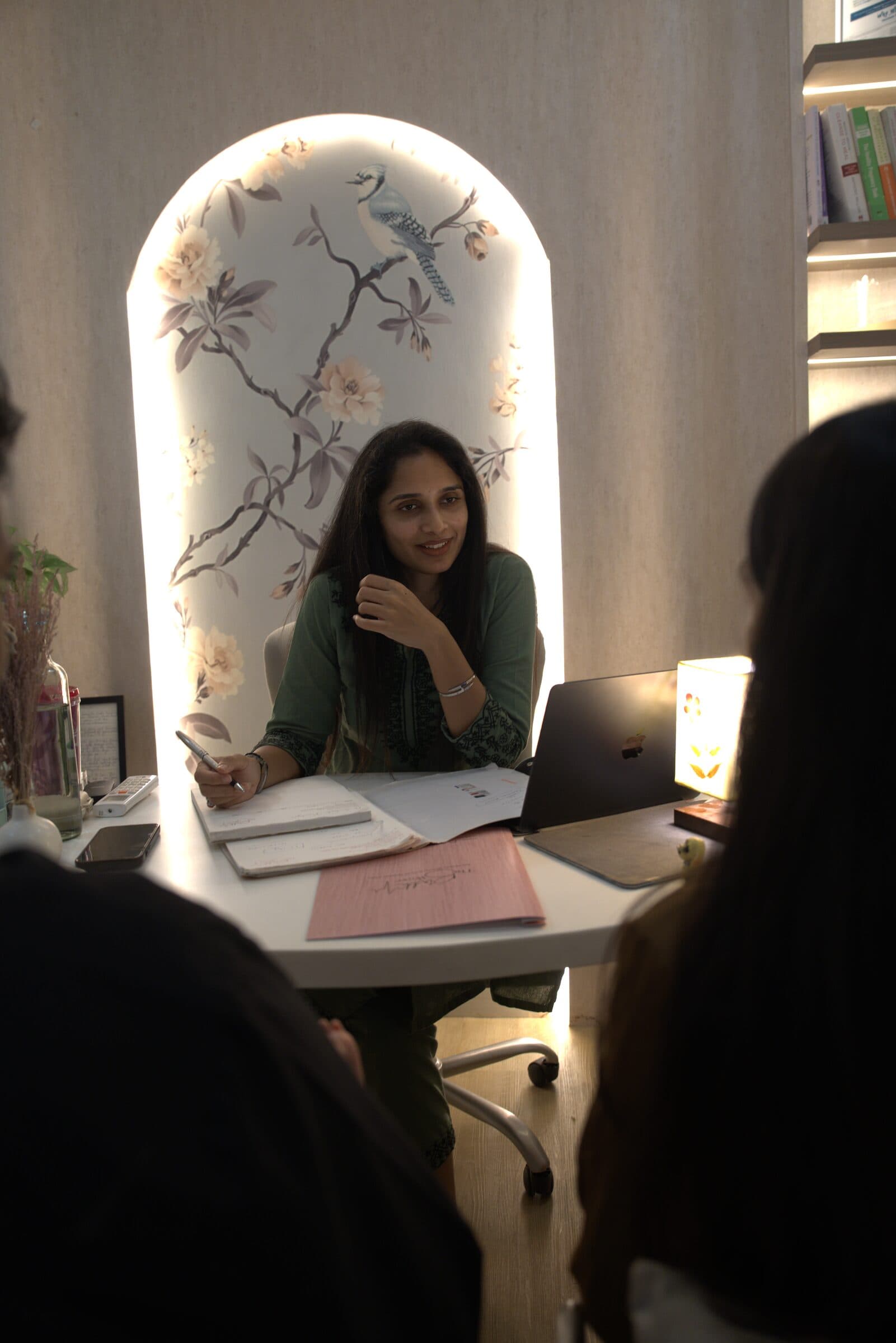 Clinician speaking with patients during a consultation